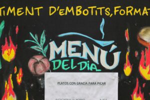 'menu del dia' written on a notice board outside a restaurant in Barcelona, Spain.