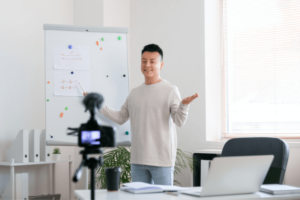 Teacher recording his class