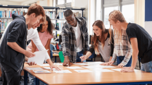 Students in a library smiling