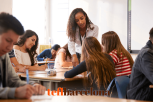 Teacher talking to a group of teenager students