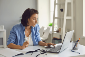 Lady looking busy at her computer